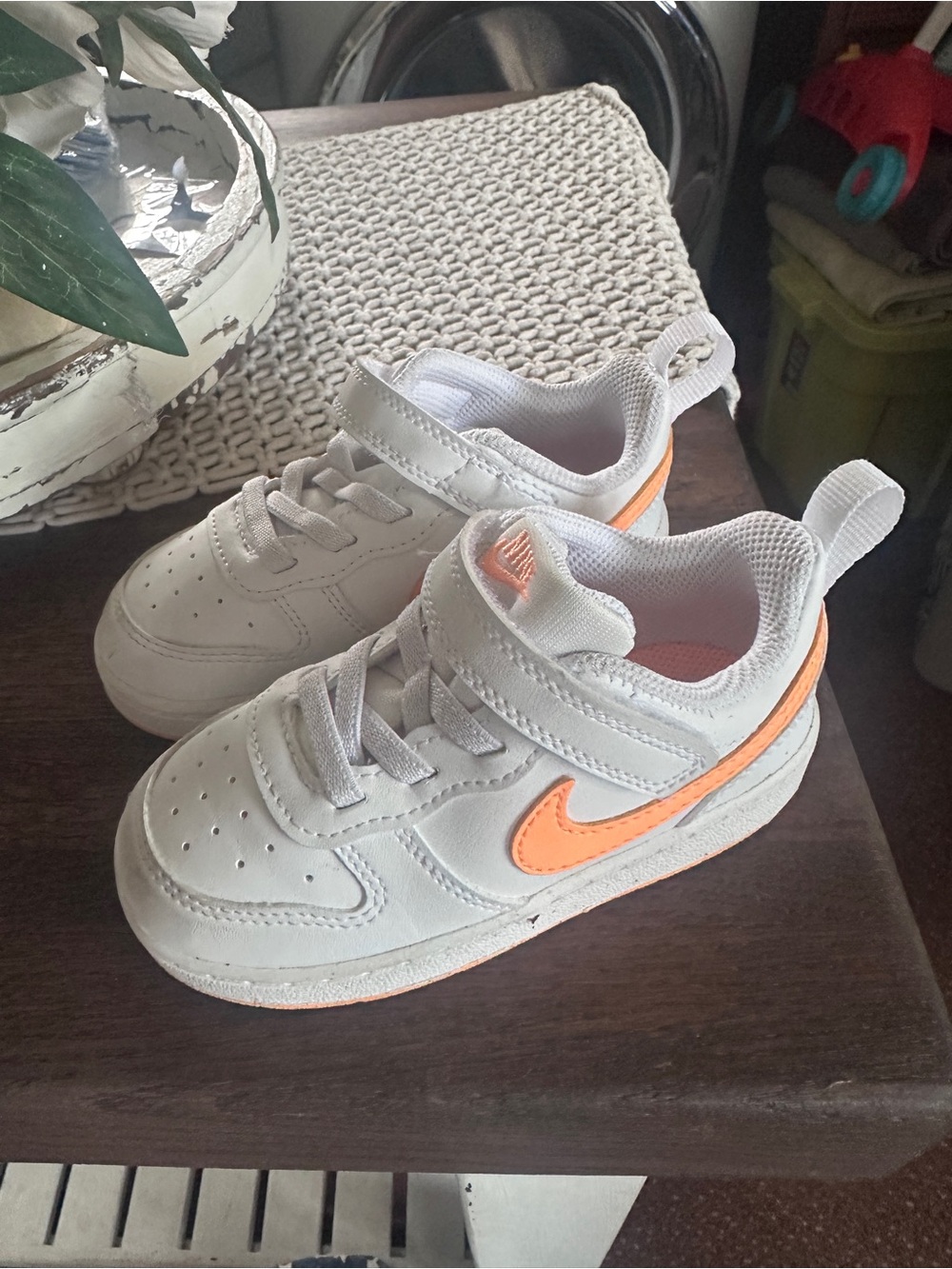 Nike Kids White Sneakers with Orange Swoosh
